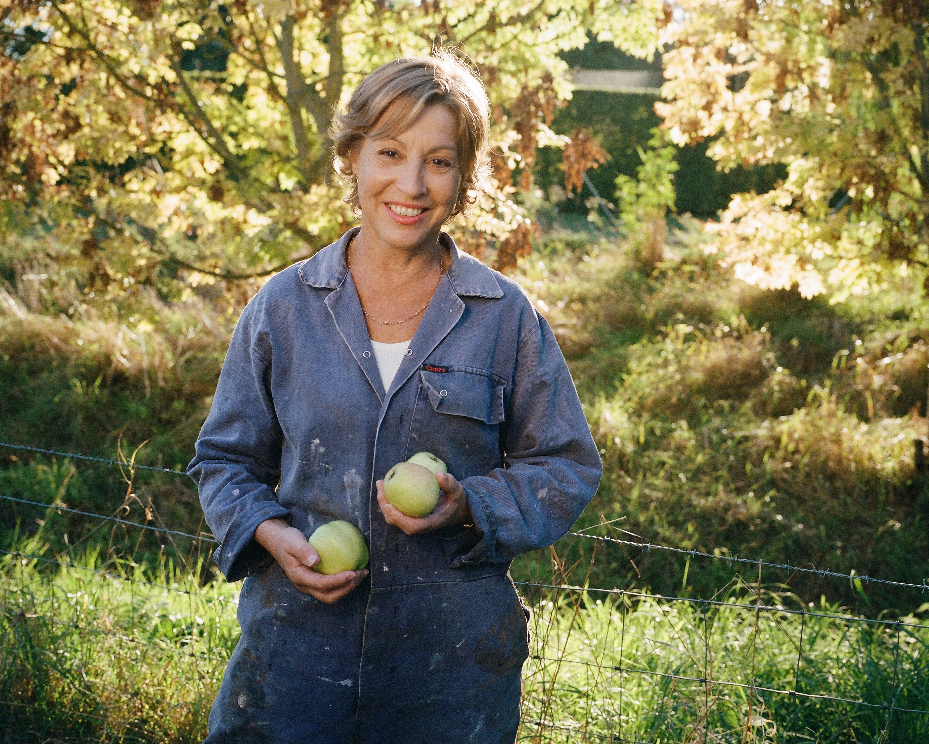 Rebecca in an orchard