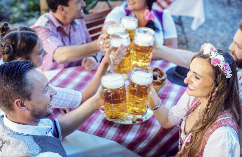 People with stein glasses at Oktoberfest