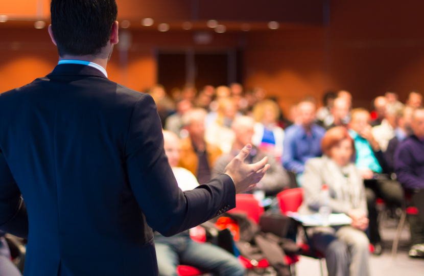 Speaker addressing an audience