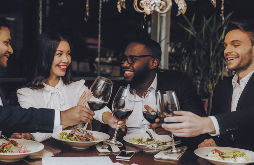 Young Professionals enjoying dinner together