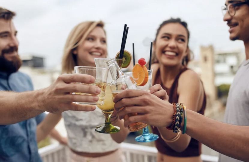 Young people having drinks.