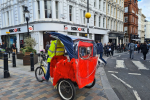 Pedicab on pavement in Westminster