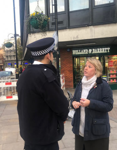 Nickie Aiken MP with police officer